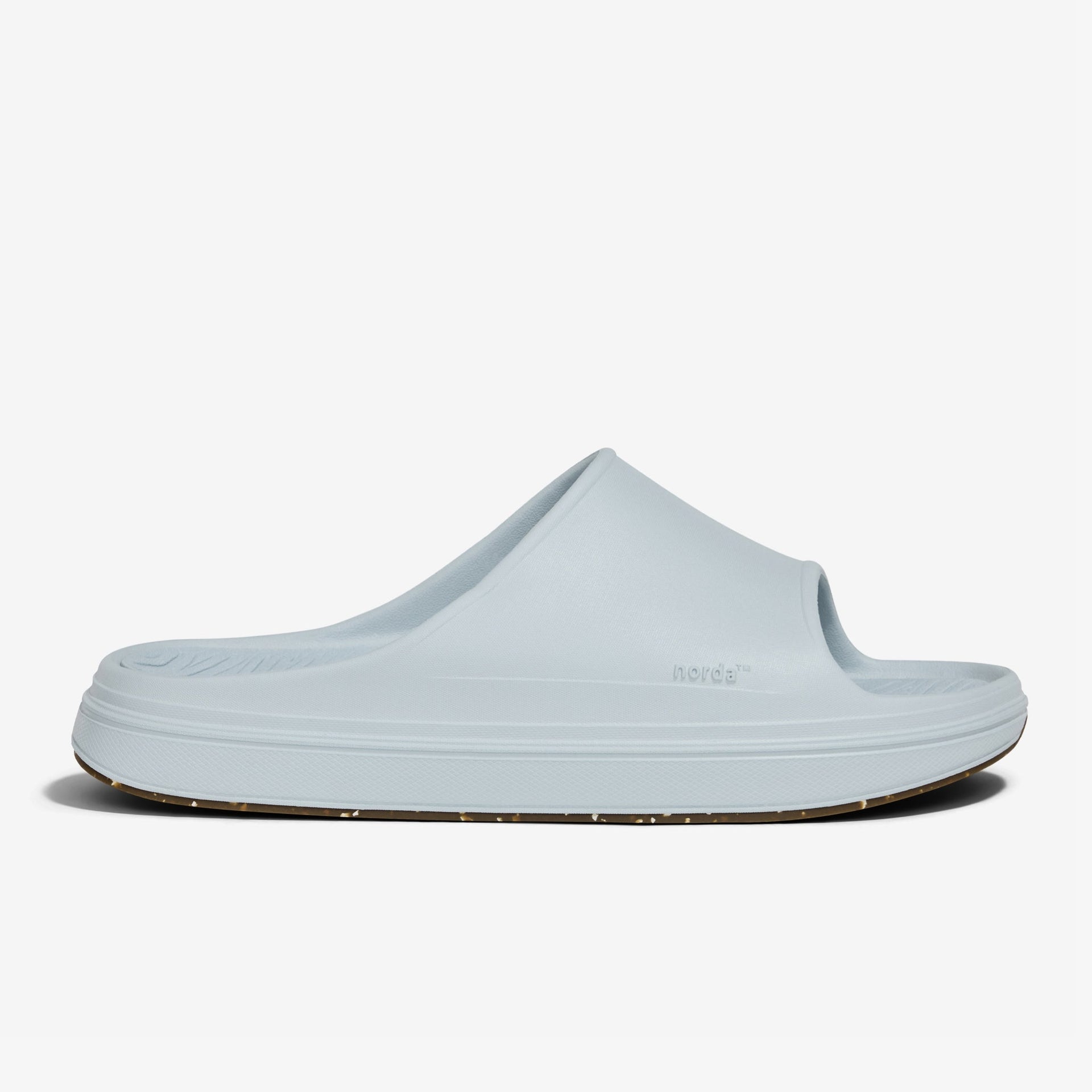 The norda® 008 recovery slide supports your feet post-run with arch support, soft foam, and a grippy Vibram® ECOSTEP sole.